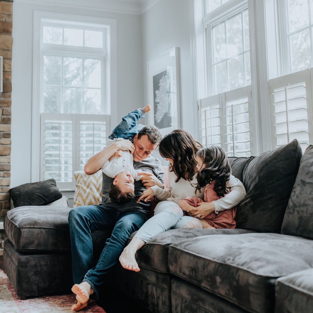 A happy family in their living space
